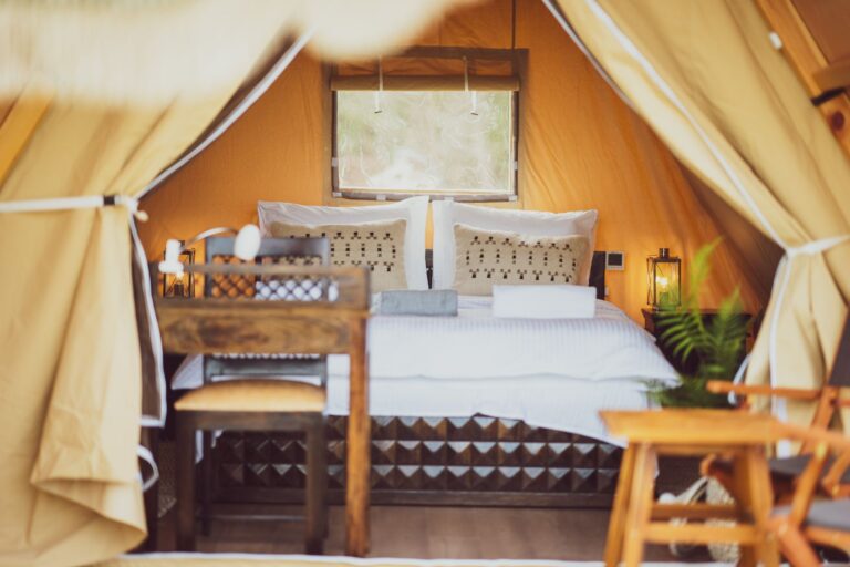 Small queen bed inside glamping tent at Mia Glamping in Saaremaa
