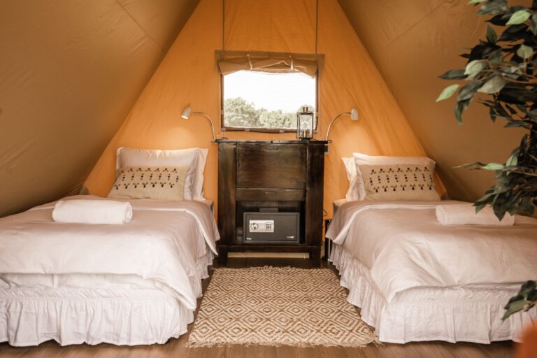 Twin beds inside glamping tent at Mia Glamping in Saaremaa with natural light