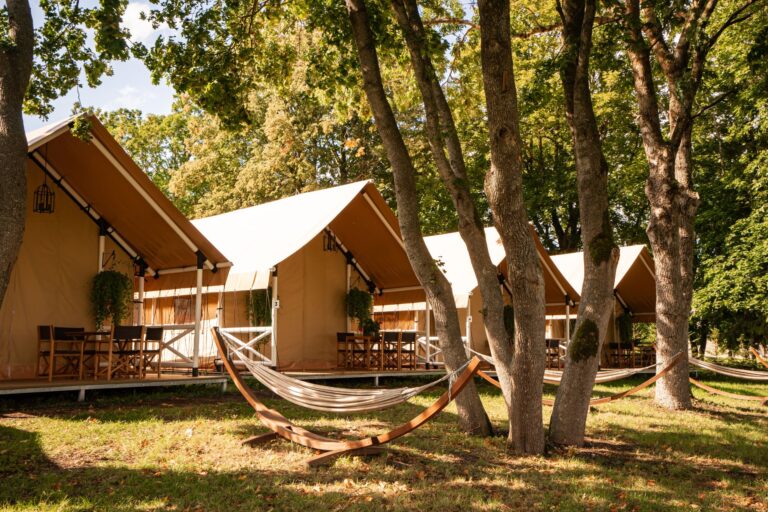 Glamping tents at Mia Glamping in Saaremaa with hammocks and outdoor relaxation area