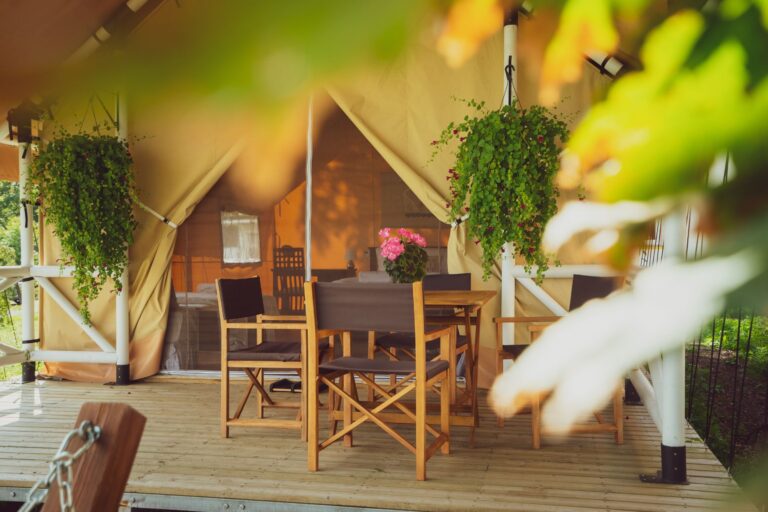 Glamping terrace at Mia Glamping in Saaremaa with outdoor seating and greenery