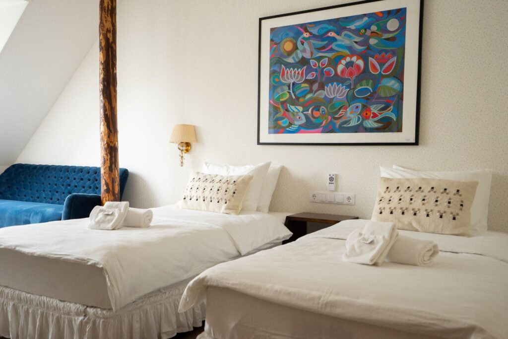 Twin room at Mia Glamping in Saaremaa with two single beds and wooden interior